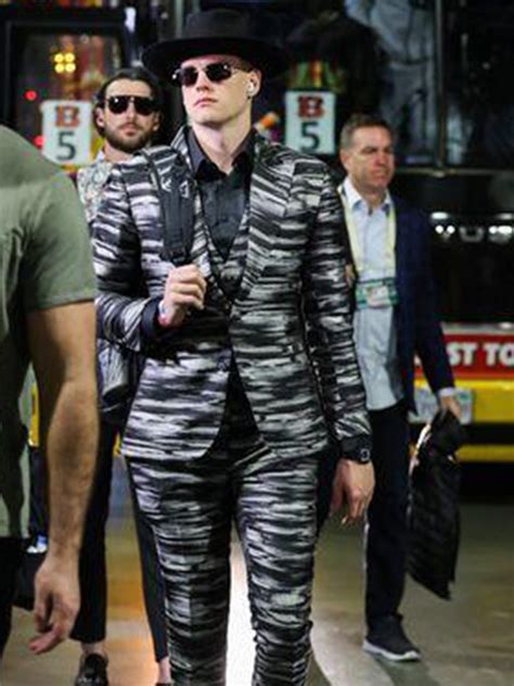 joe burrow wearing a suit.